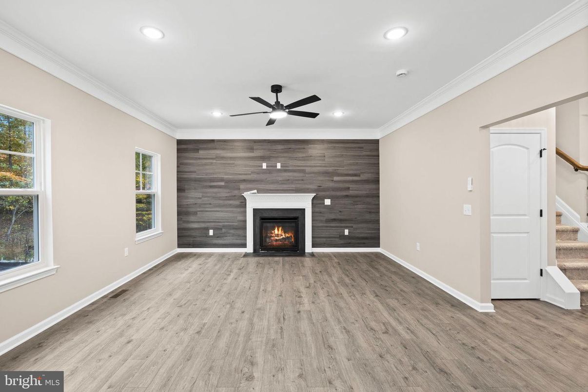 Empty room, Fireplace, Interior, Recessed Lighting, Wood Texture Flooring, Wooden Walls