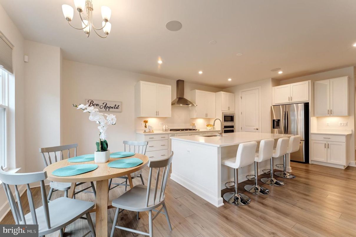 Chandelier, Dining room, Interior, Kitchen, Recessed Lighting, Stainless Steel Appliances, Wood Texture Flooring