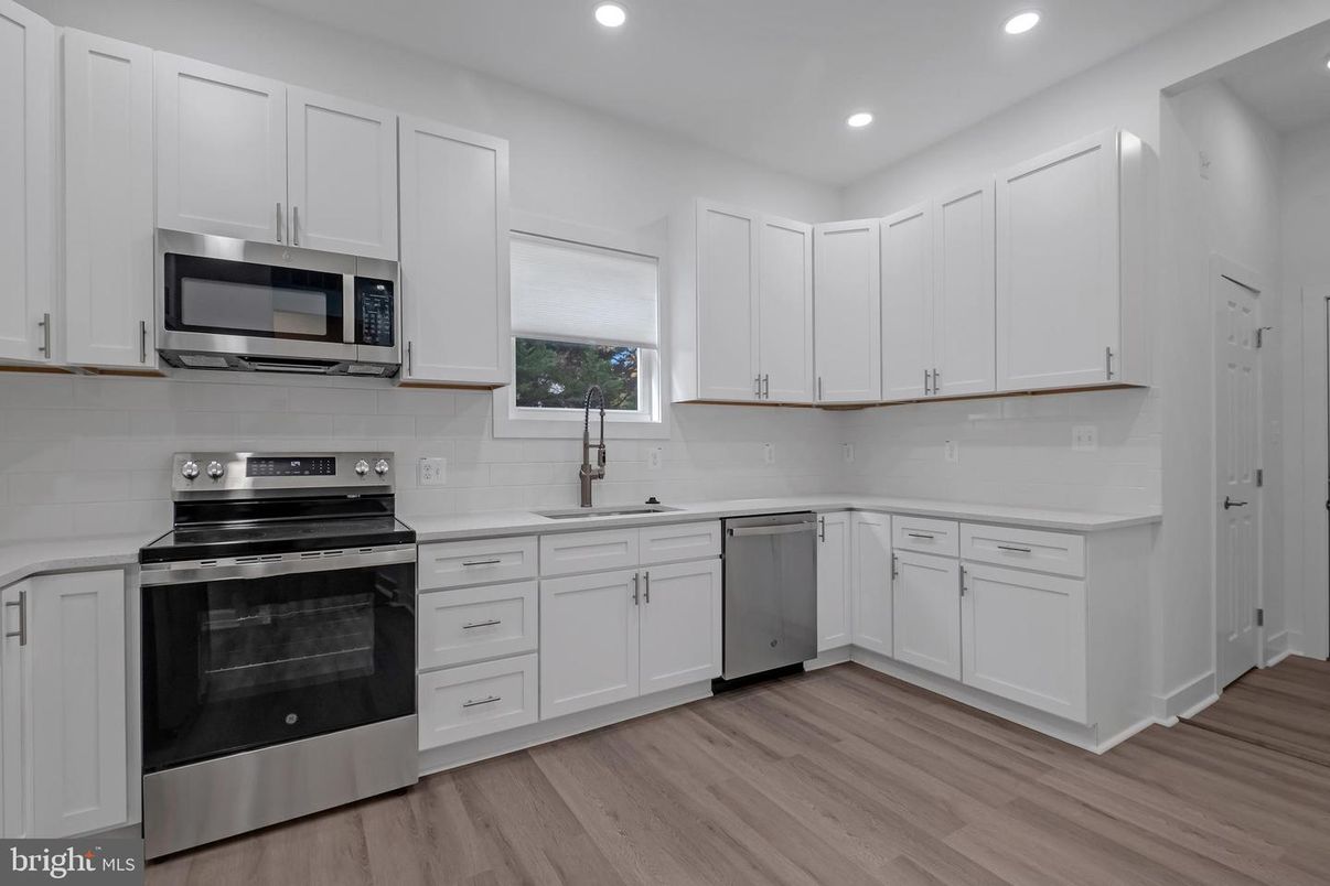 Interior, Kitchen, Recessed Lighting, Stainless Steel Appliances, Wood Texture Flooring