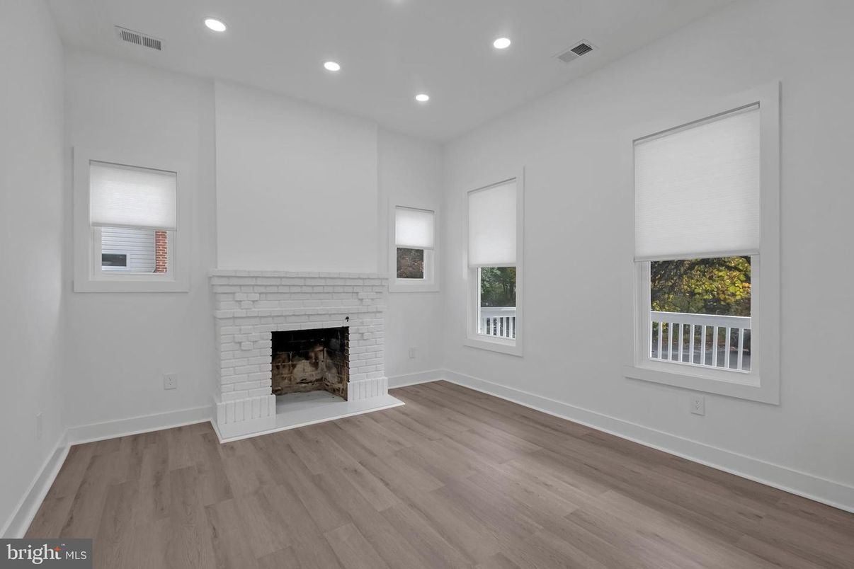 Empty room, Fireplace, Interior, Recessed Lighting, Wood Texture Flooring
