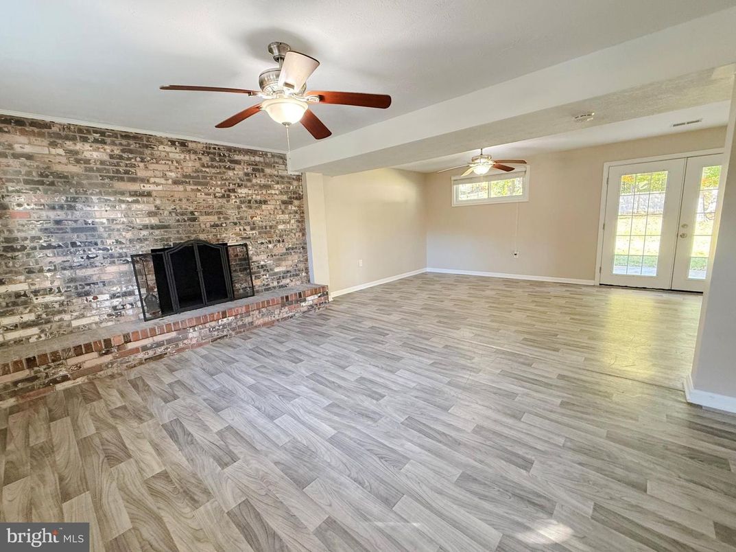 Empty room, Fireplace, Interior, Stone Walls, Wood Texture Flooring