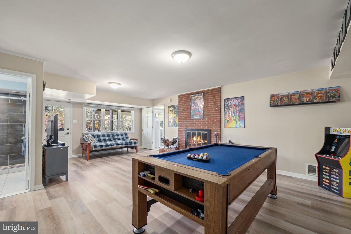 Billiard Table, Fireplace, Game Room, Interior, Stone Walls, Wood Texture Flooring