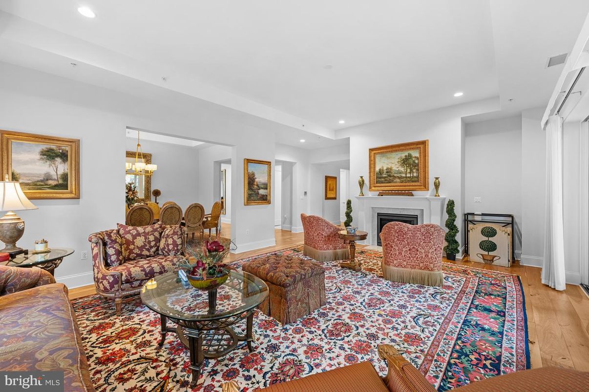 Dining room, Fireplace, Interior, Living room, Recessed Lighting, Wood Texture Flooring