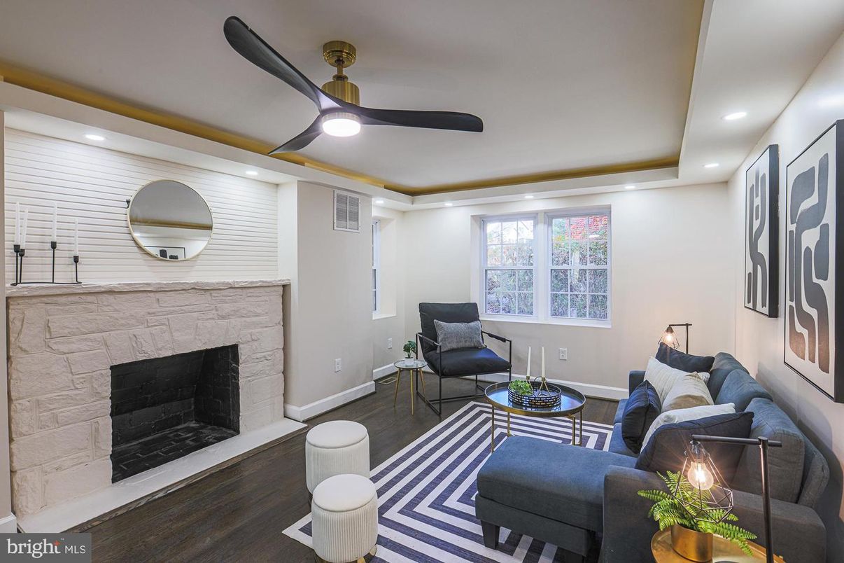 Fireplace, Interior, Living room, Recessed Lighting, Stone Walls, Wood Texture Flooring