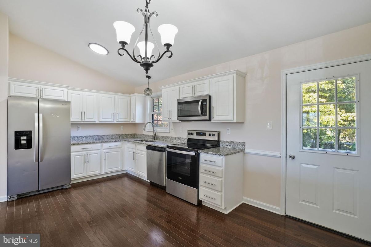 Chandelier, Interior, Kitchen, Pendant Lights, Recessed Lighting, Stainless Steel Appliances, Wood Texture Flooring