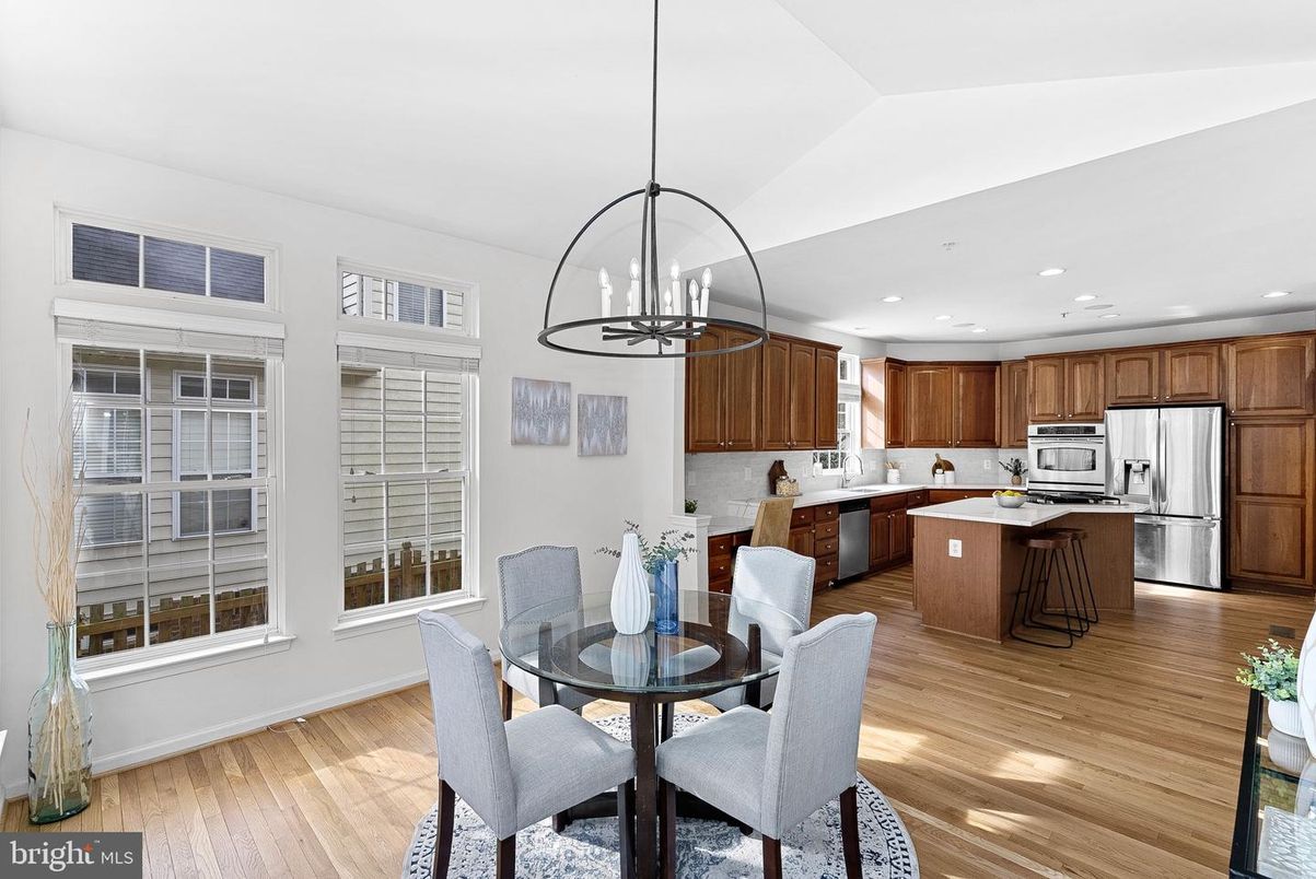 Dining room, Interior, Kitchen, Pendant Lights, Recessed Lighting, Stainless Steel Appliances, Wood Texture Flooring