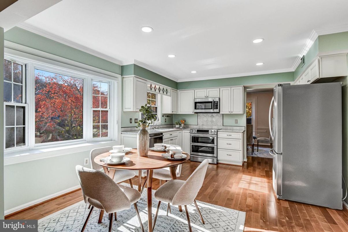 Dining room, Interior, Kitchen, Recessed Lighting, Stainless Steel Appliances, Wood Texture Flooring