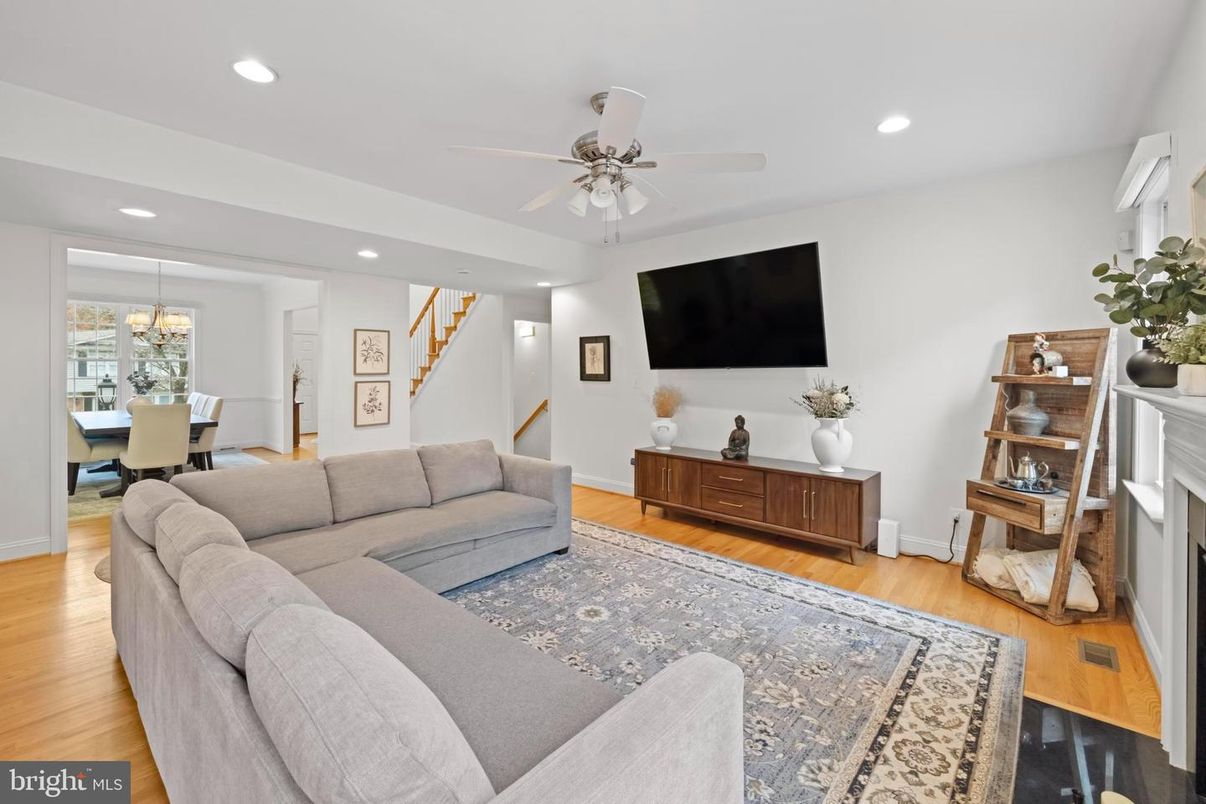 Dining room, Fireplace, Interior, Living room, Recessed Lighting, Wood Texture Flooring