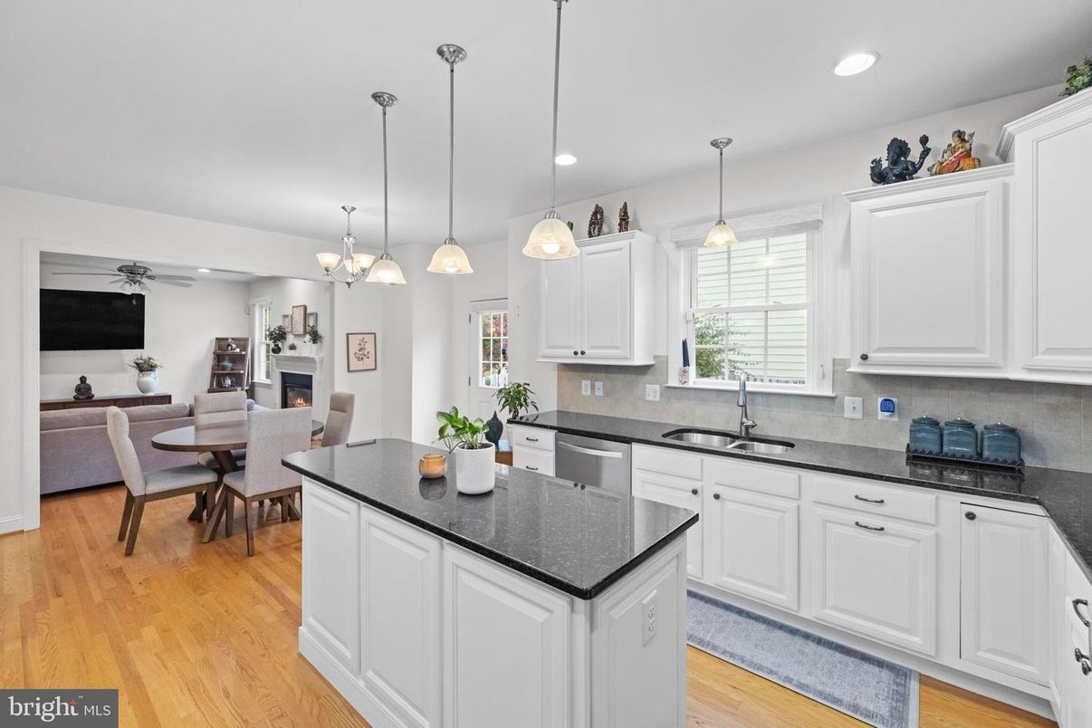 Dining room, Fireplace, Interior, Kitchen, Pendant Lights, Recessed Lighting, Wood Texture Flooring