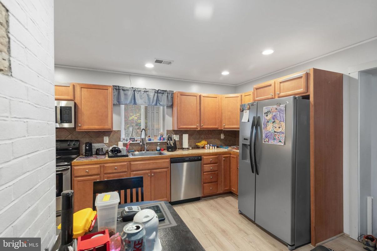 Interior, Kitchen, Recessed Lighting, Stainless Steel Appliances, Stone Walls, Wood Texture Flooring