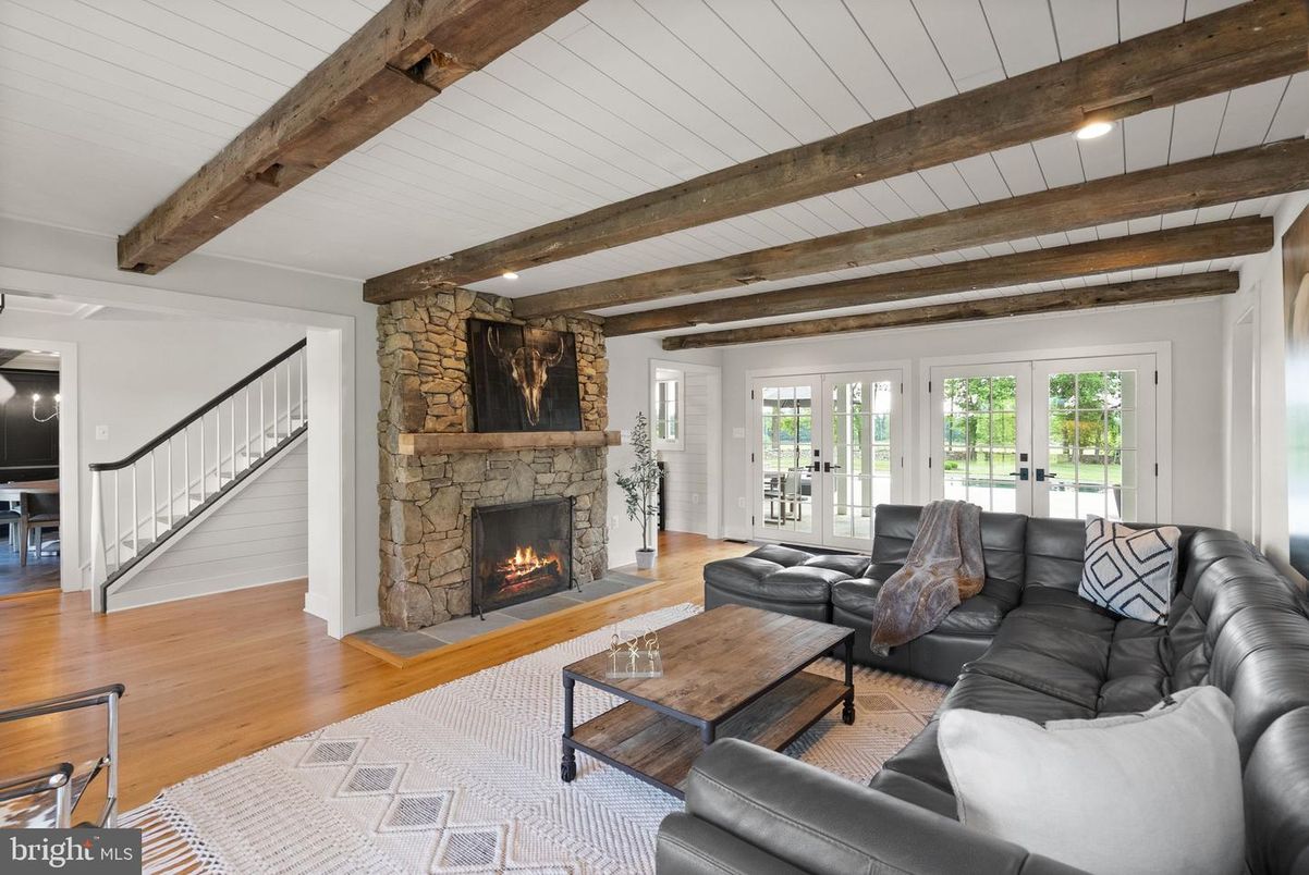 Fireplace, Interior, Living room, Recessed Lighting, Stone Walls, Wooden Beams, Wood Texture Flooring