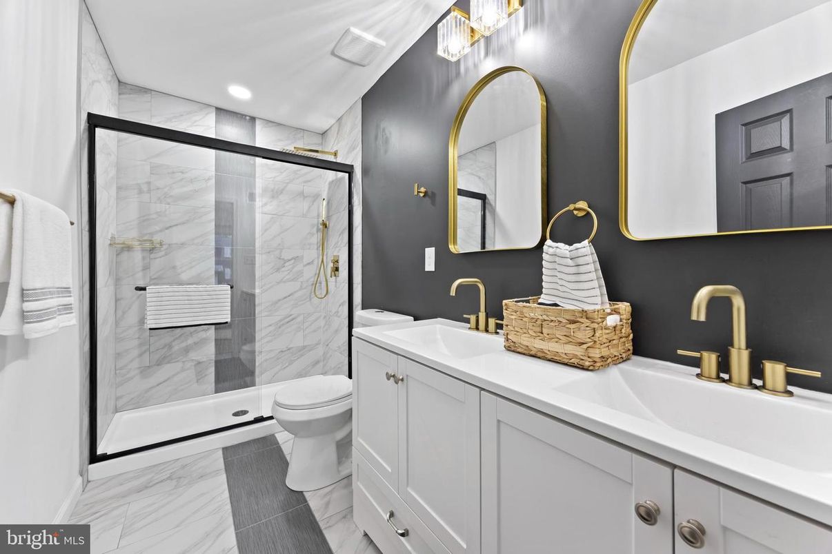Bathroom, Dual Sink Vanities, Glass Shower, Interior, Marble, Marble Walls, Recessed Lighting