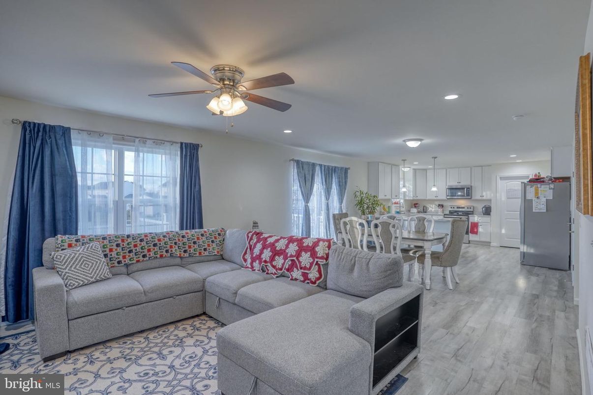 Dining room, Interior, Kitchen, Living room, Recessed Lighting, Stainless Steel Appliances, Wood Texture Flooring