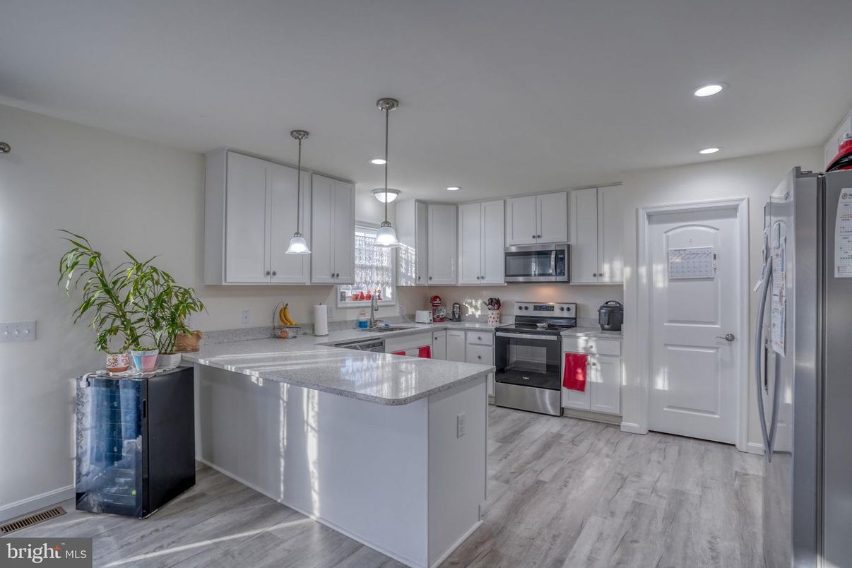 Interior, Kitchen, Pendant Lights, Recessed Lighting, Stainless Steel Appliances, Wood Texture Flooring