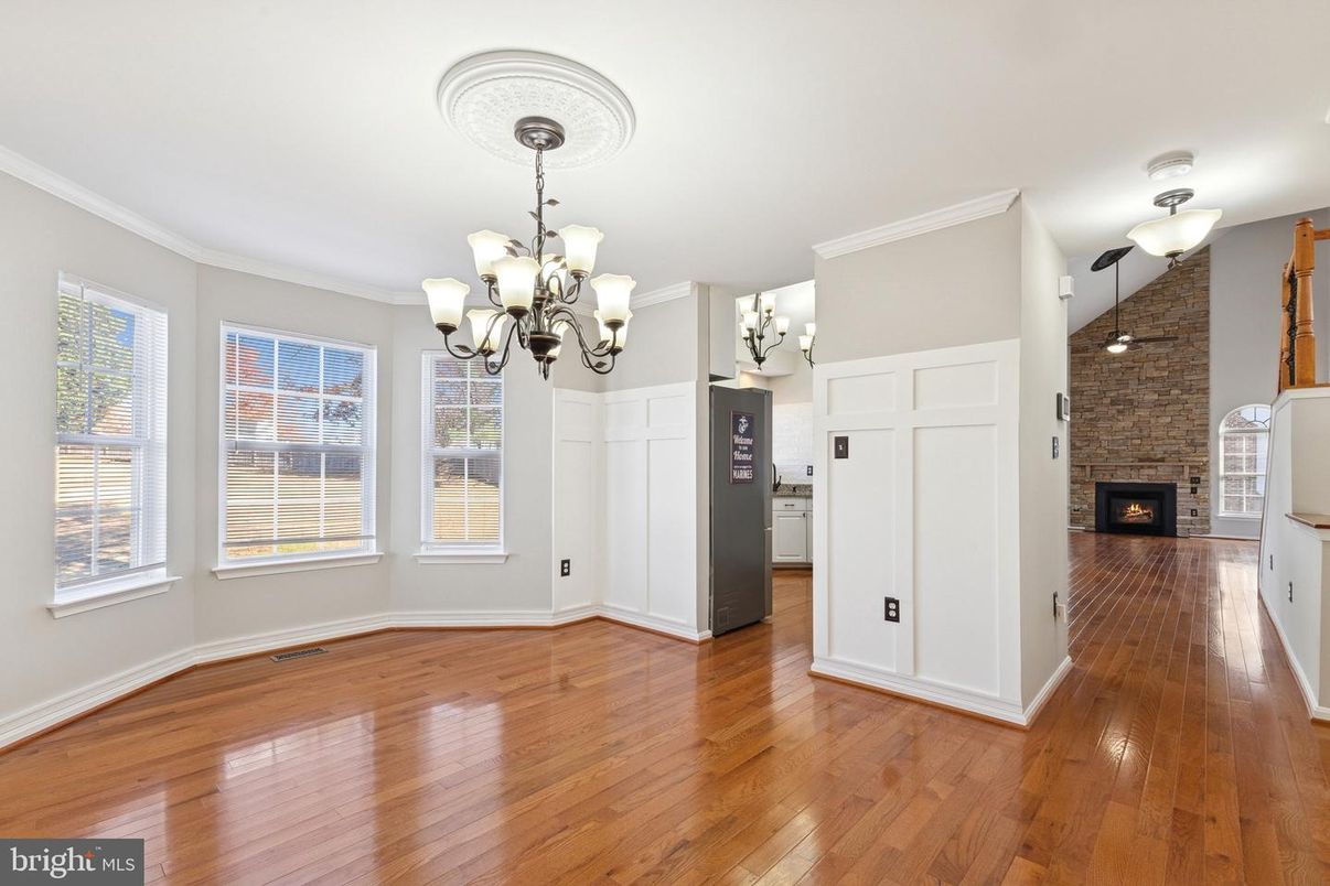 Chandelier, Empty room, Fireplace, Interior, Stone Walls, Wood Texture Flooring
