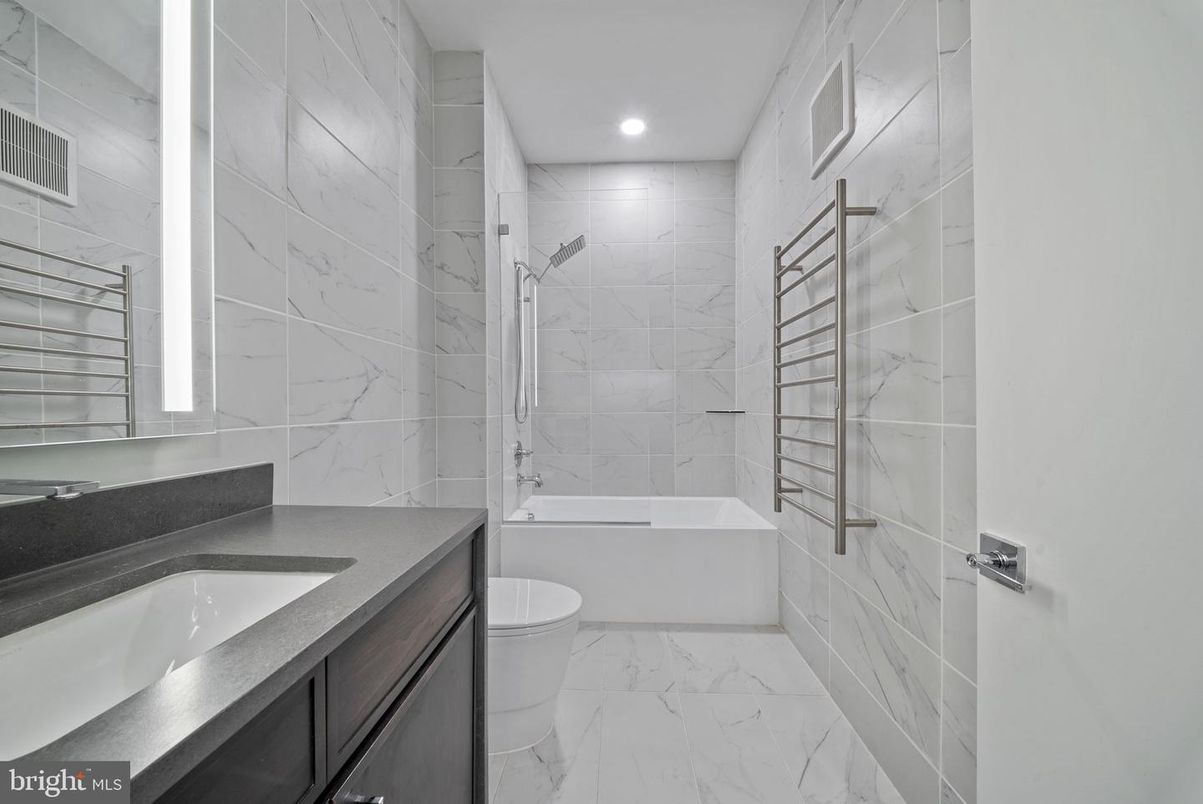 Bathroom, Dual Sink Vanities, Interior, Marble, Marble Walls, Recessed Lighting