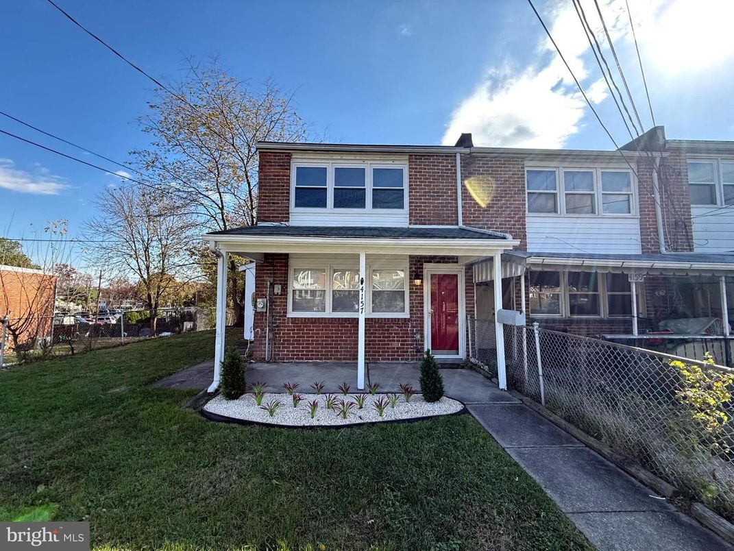 Exterior, Facade, Brick Facade, American Foursquare