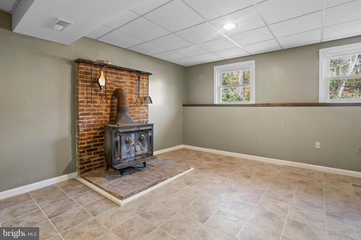 Empty room, Fireplace, Interior, Recessed Lighting, Stone Walls