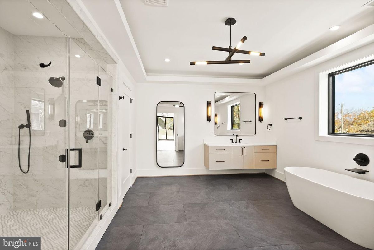 Bathroom, Dual Sink Vanities, Free Standing Baths, Glass Shower, Interior, Marble Walls, Pendant Lights, Recessed Lighting