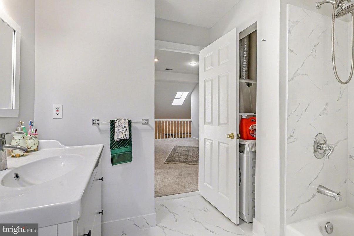 Bathroom, Dual Sink Vanities, Interior, Marble, Marble Walls, Recessed Lighting
