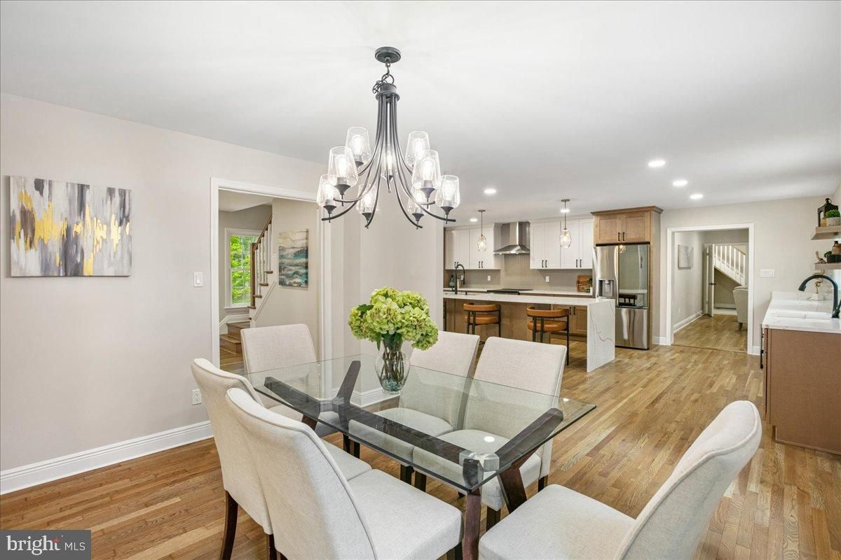 Chandelier, Dining room, Interior, Kitchen, Recessed Lighting, Stainless Steel Appliances, Wood Texture Flooring