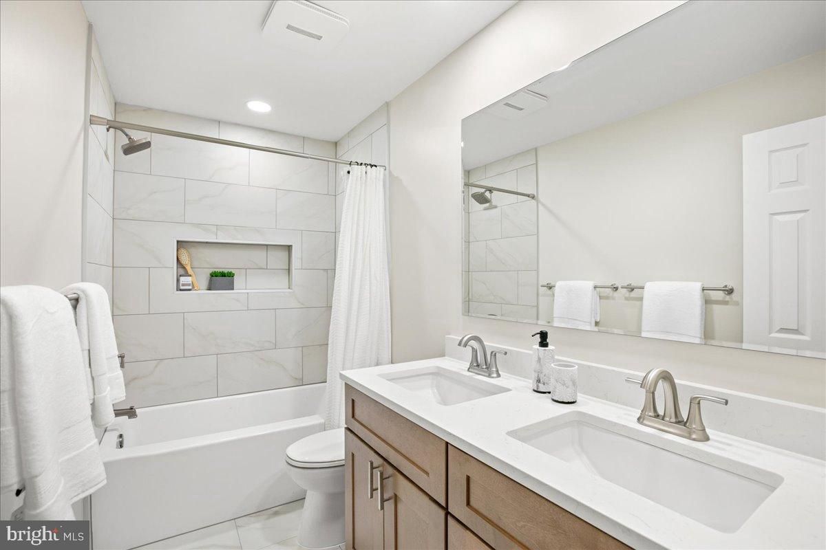 Bathroom, Dual Sink Vanities, Interior, Marble, Marble Walls, Recessed Lighting