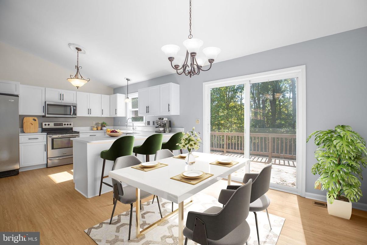 Chandelier, Dining room, Interior, Kitchen, Pendant Lights, Stainless Steel Appliances, Wood Texture Flooring