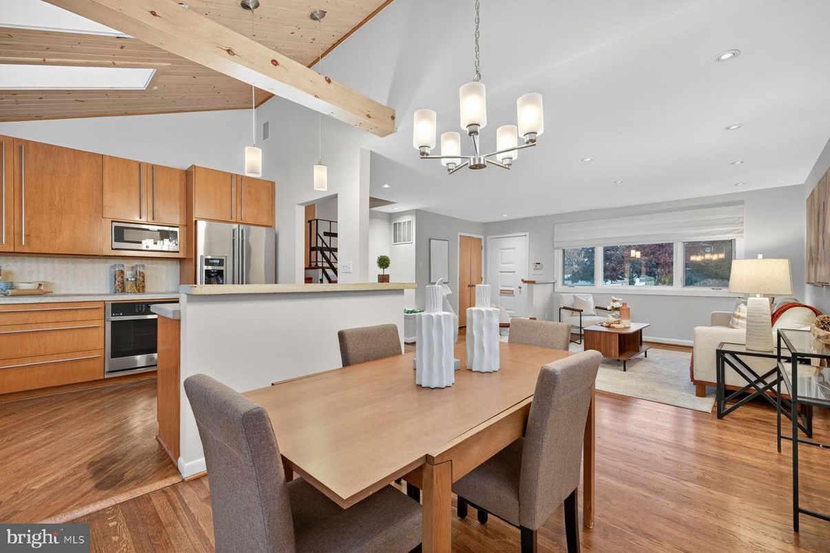 Chandelier, Dining room, Interior, Kitchen, Living room, Pendant Lights, Recessed Lighting, Stainless Steel Appliances, Wooden Beams, Wood Texture Flooring