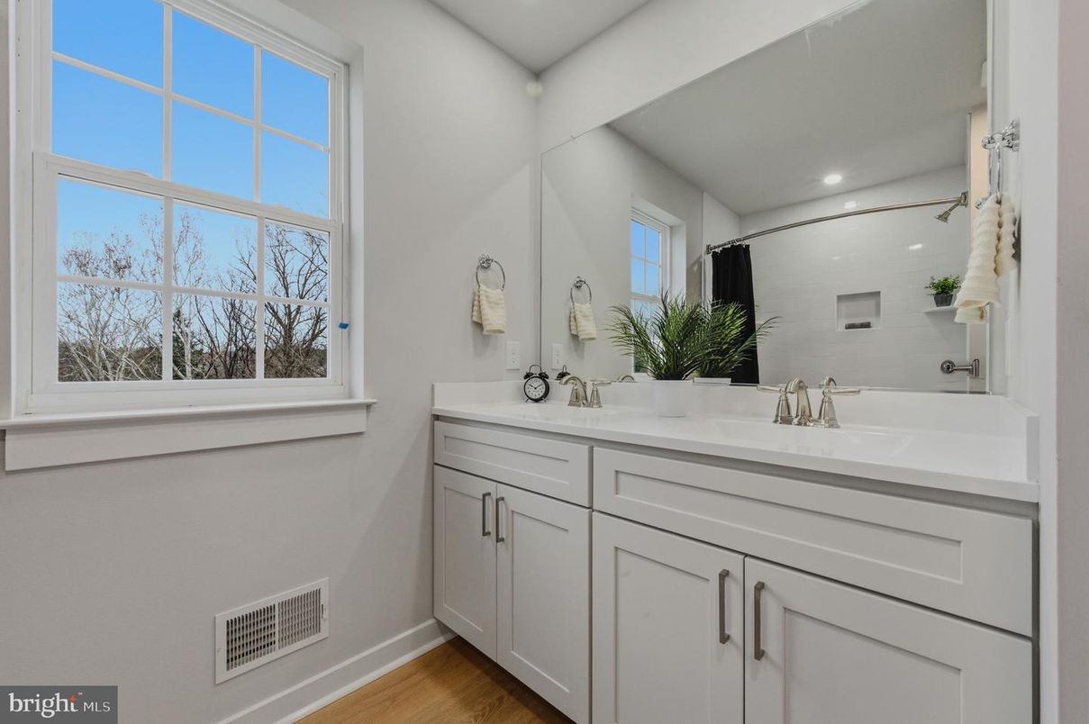 Bathroom, Dual Sink Vanities, Interior, Recessed Lighting, Wood Texture Flooring