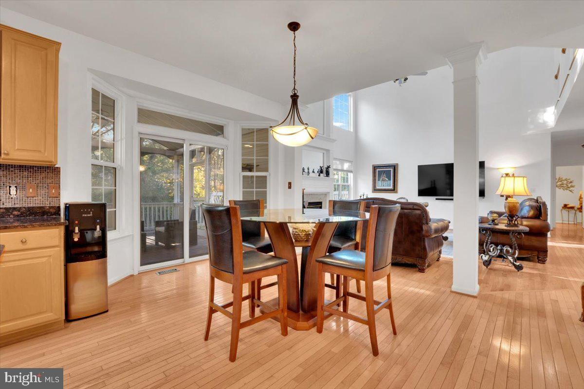 Dining room, Fireplace, Interior, Living room, Pendant Lights, Wood Texture Flooring