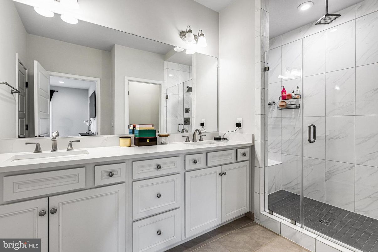 Bathroom, Dual Sink Vanities, Glass Shower, Interior, Marble Walls, Recessed Lighting