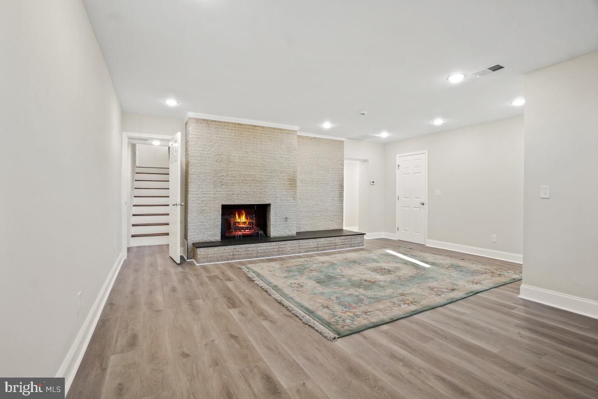 Empty room, Fireplace, Interior, Recessed Lighting, Wood Texture Flooring