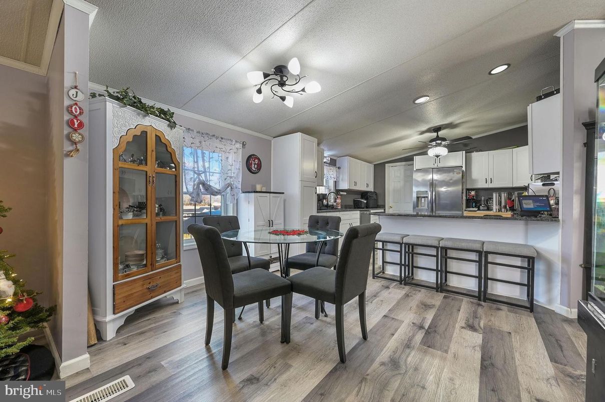 Dining room, Interior, Kitchen, Recessed Lighting, Stainless Steel Appliances, Wood Texture Flooring