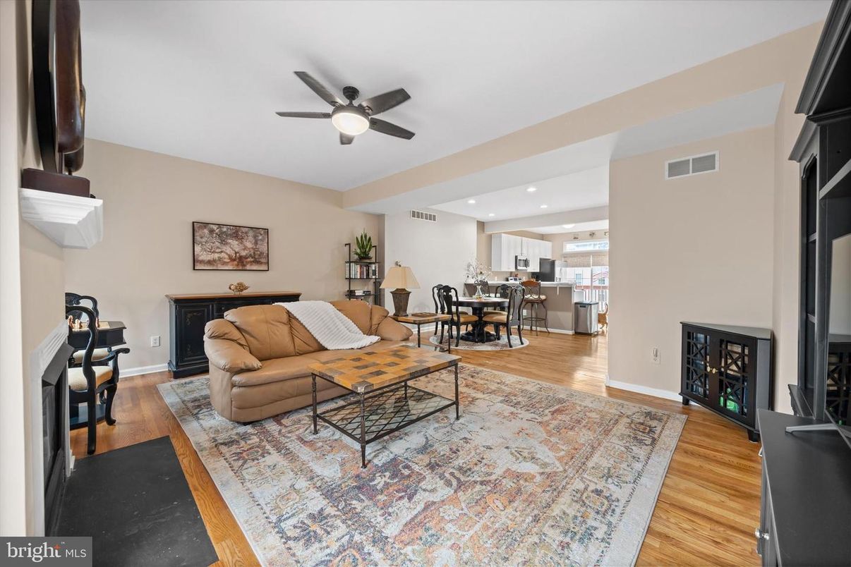 Dining room, Fireplace, Interior, Kitchen, Living room, Recessed Lighting, Wood Texture Flooring
