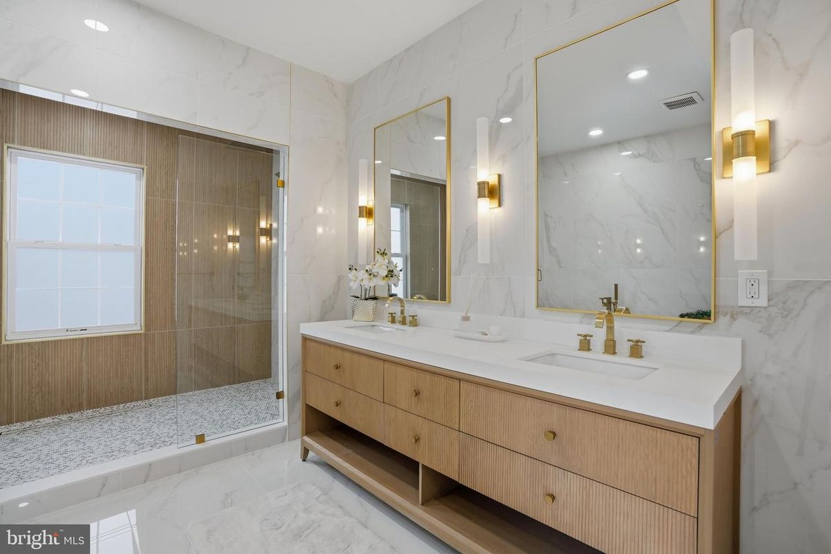 Bathroom, Dual Sink Vanities, Glass Shower, Interior, Marble, Marble Walls, Recessed Lighting