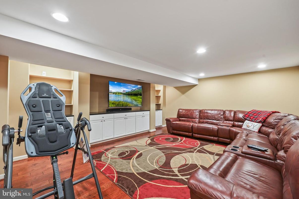 Home Theatre Room, Fitness Equipment, Interior, Living room, Recessed Lighting, Wood Texture Flooring