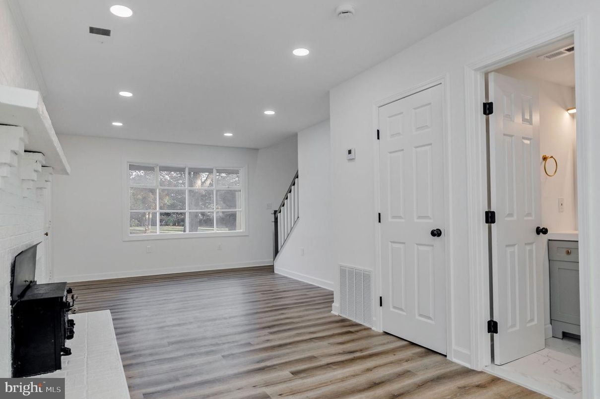 Empty room, Fireplace, Interior, Recessed Lighting, Wood Texture Flooring