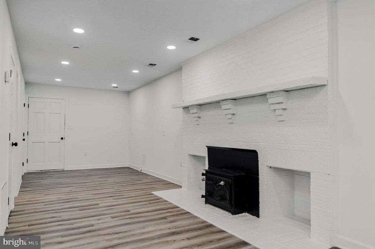 Empty room, Fireplace, Interior, Recessed Lighting, Wood Texture Flooring