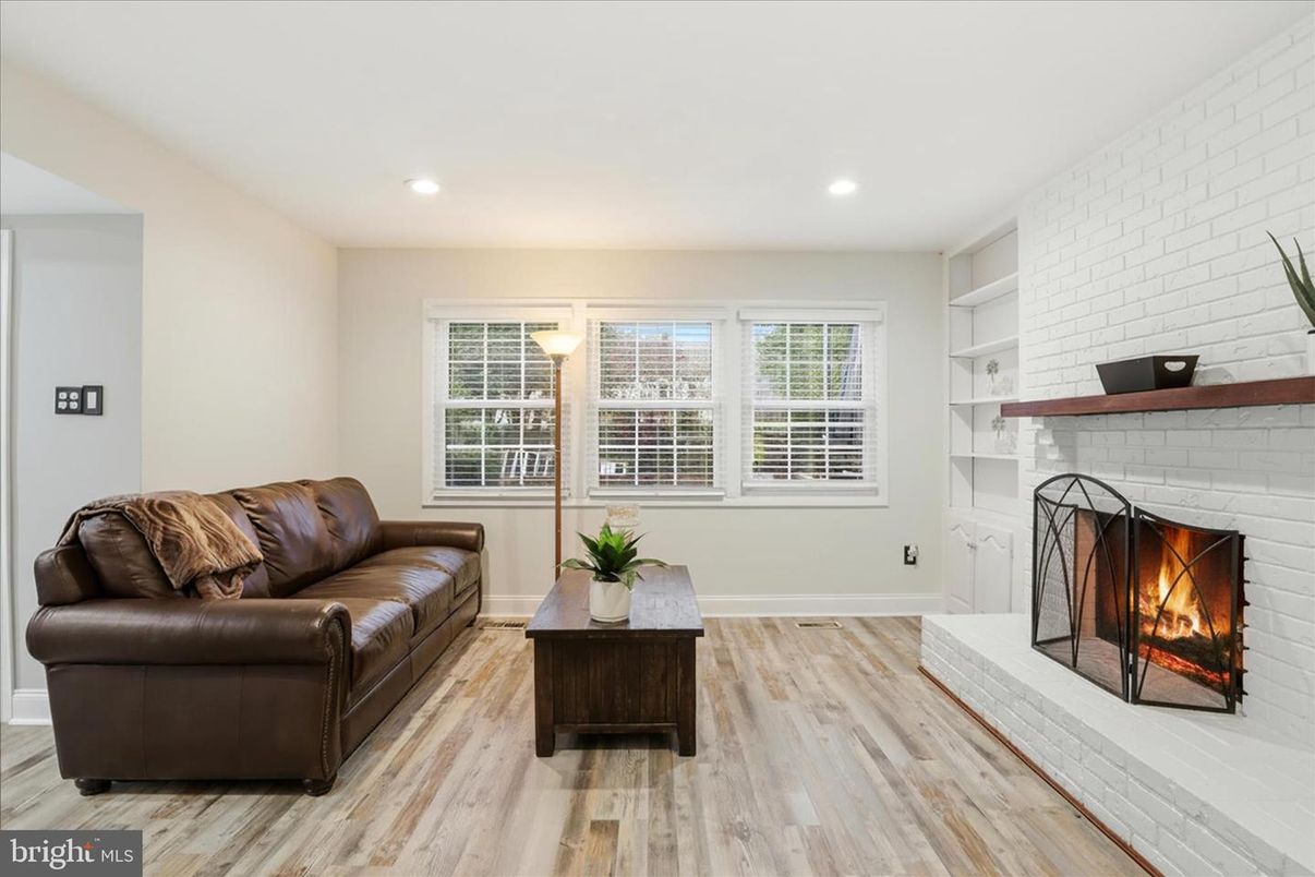 Fireplace, Interior, Recessed Lighting, Stone Walls, Wood Texture Flooring