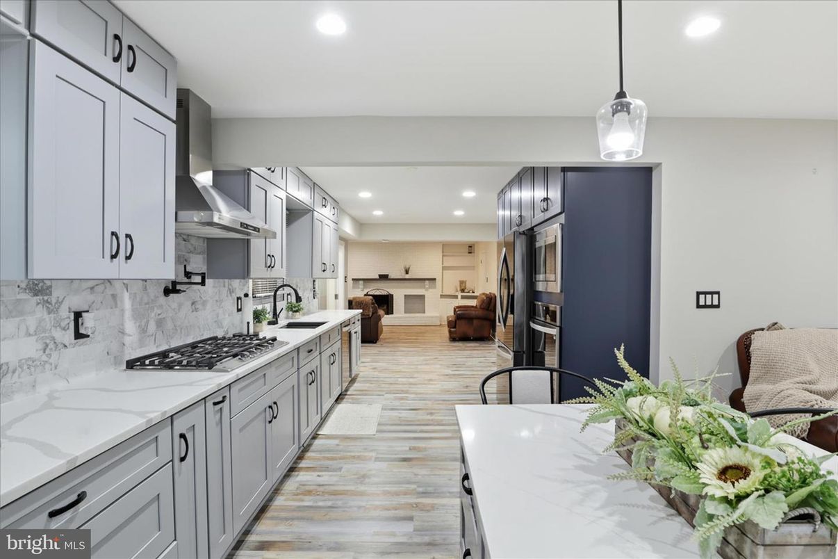 Interior, Kitchen, Pendant Lights, Recessed Lighting, Stainless Steel Appliances, Wood Texture Flooring