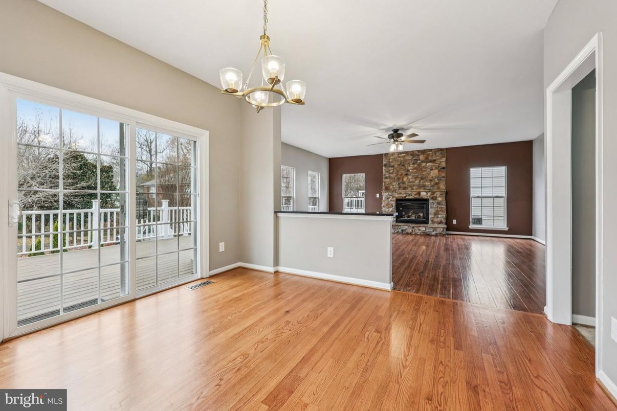 Empty room, Fireplace, Interior, Pendant Lights, Wood Texture Flooring