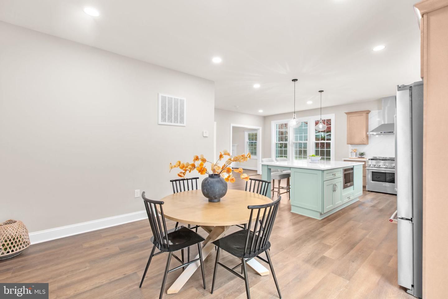 Dining room, Interior, Kitchen, Pendant Lights, Recessed Lighting, Stainless Steel Appliances, Wood Texture Flooring