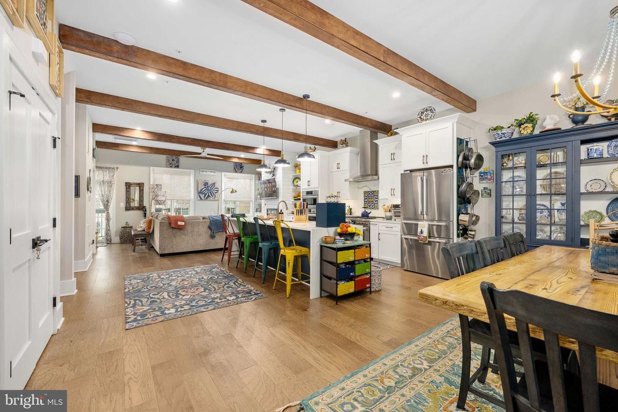 Dining room, Interior, Kitchen, Living room, Pendant Lights, Recessed Lighting, Stainless Steel Appliances, Wooden Beams, Wood Texture Flooring