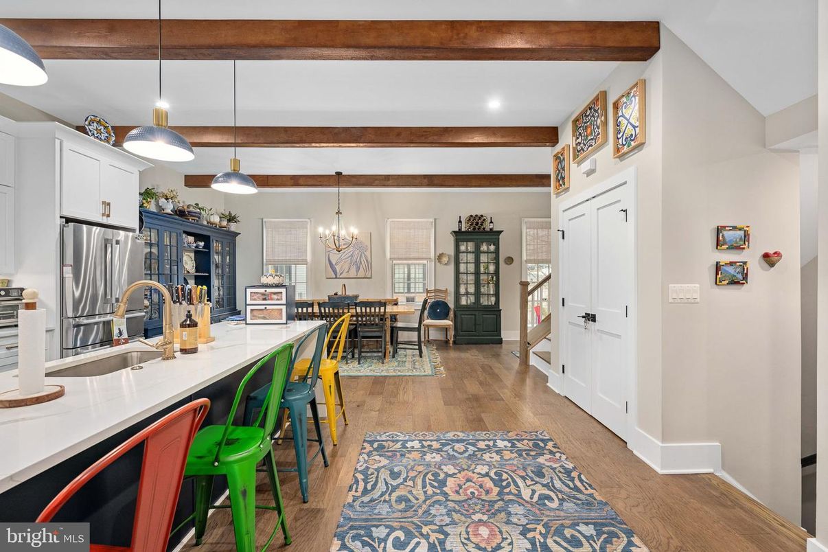 Chandelier, Dining room, Interior, Kitchen, Pendant Lights, Recessed Lighting, Stainless Steel Appliances, Wooden Beams, Wood Texture Flooring