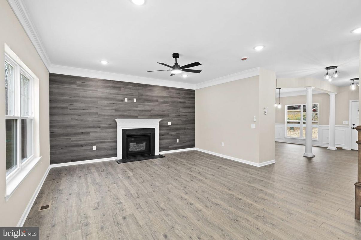 Empty room, Fireplace, Interior, Recessed Lighting, Wood Texture Flooring, Wooden Walls
