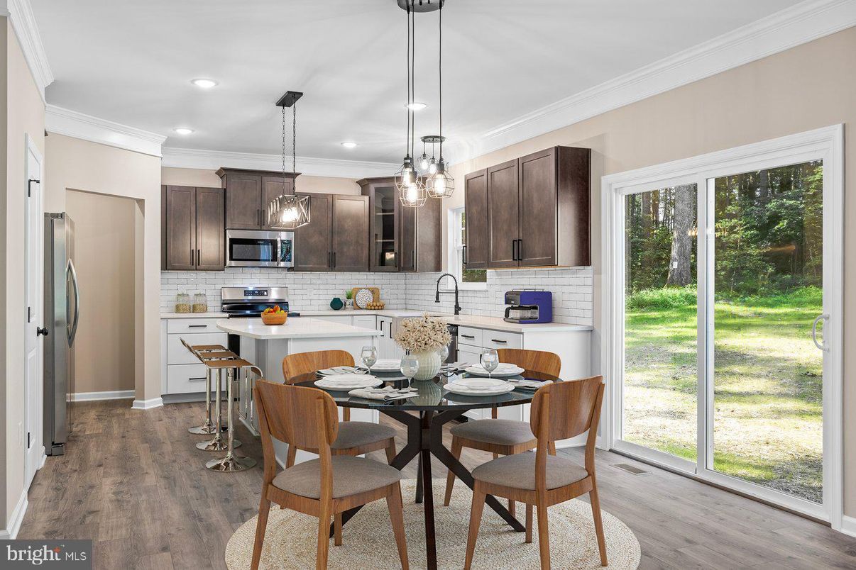 Dining room, Interior, Kitchen, Pendant Lights, Recessed Lighting, Stainless Steel Appliances, Wood Texture Flooring