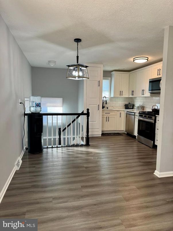 Interior, Kitchen, Pendant Lights, Stainless Steel Appliances, Wood Texture Flooring