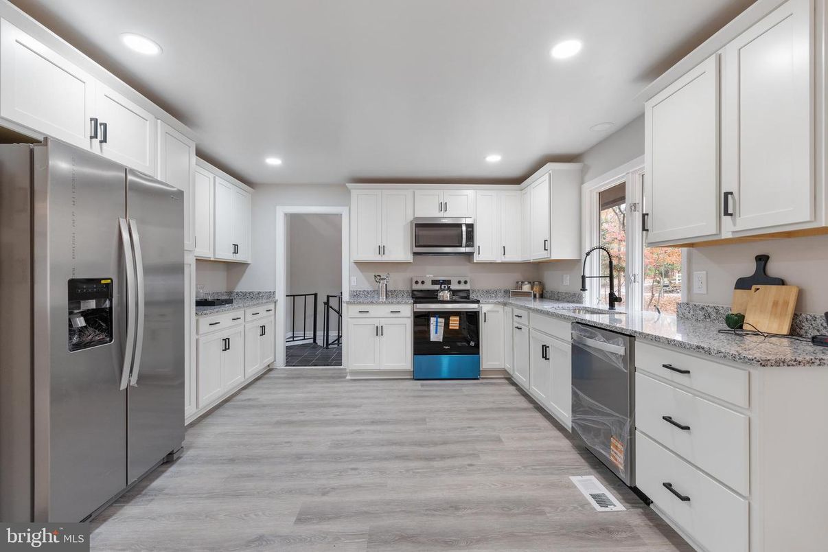 Interior, Kitchen, Recessed Lighting, Stainless Steel Appliances, Wood Texture Flooring