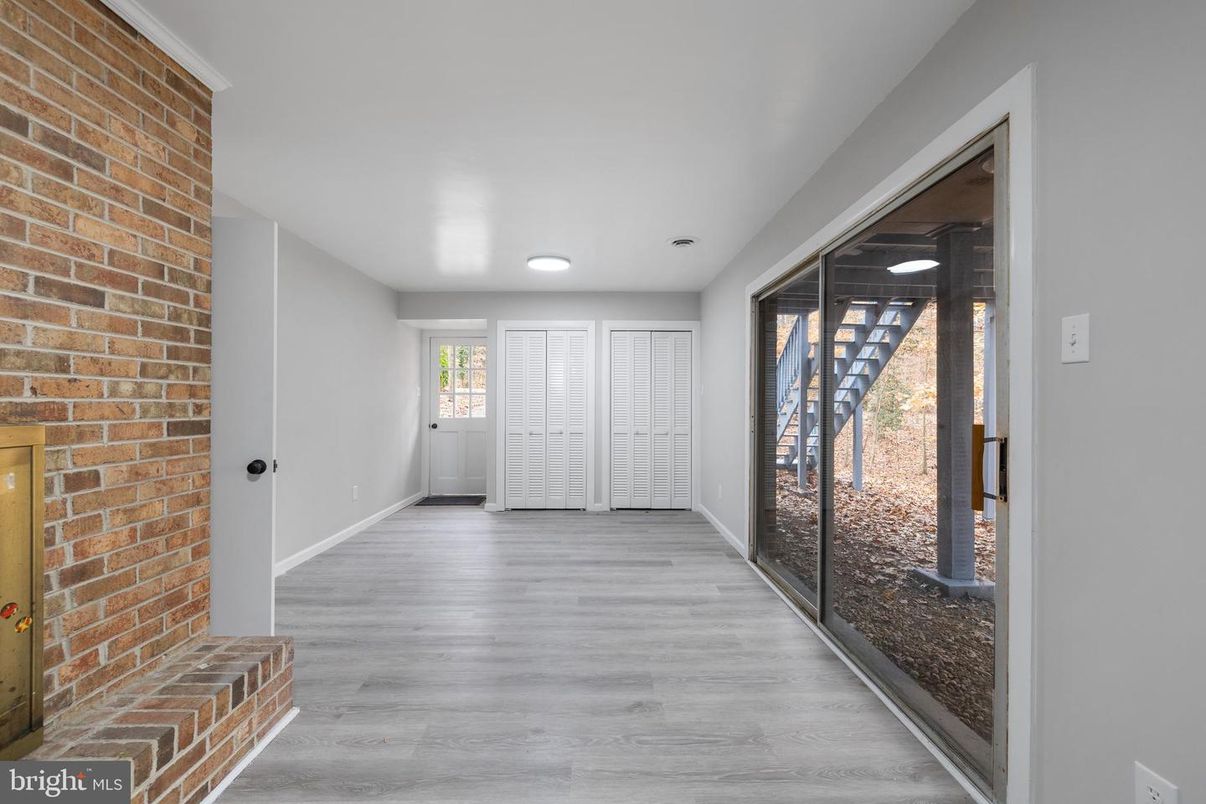 Empty room, Interior, Recessed Lighting, Stone Walls, Wood Texture Flooring