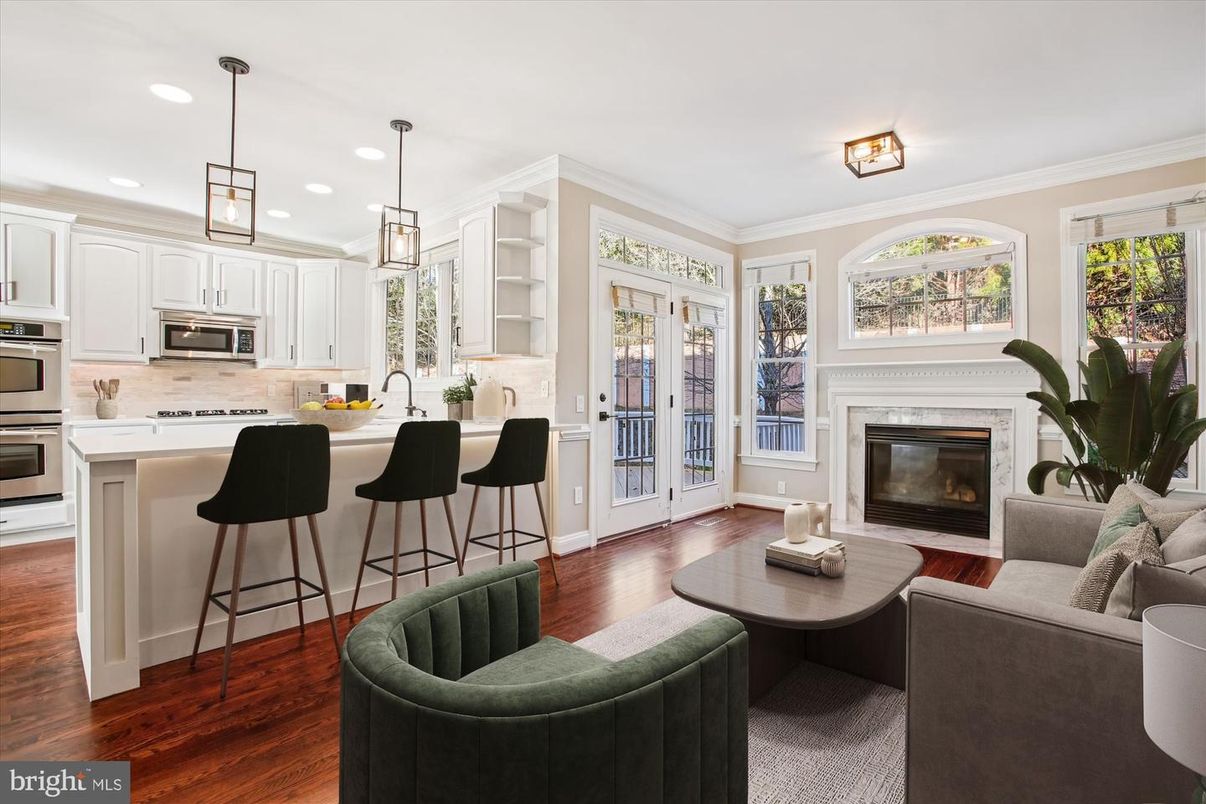 Fireplace, Interior, Kitchen, Living room, Pendant Lights, Recessed Lighting, Stainless Steel Appliances, Wood Texture Flooring